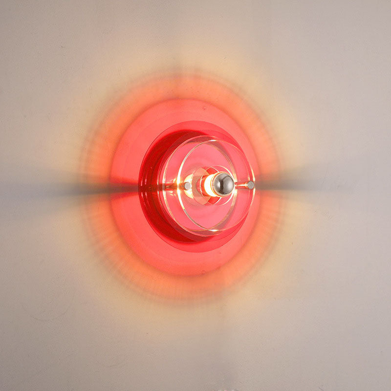 Applique da parete a forma di disco volante in ferro e acrilico colorato contemporaneo per sala di intrattenimento con 1 luce
