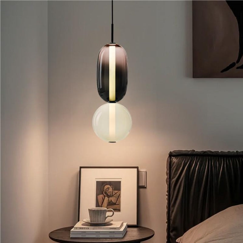 Lampada a sospensione Syro in vetro caramellato