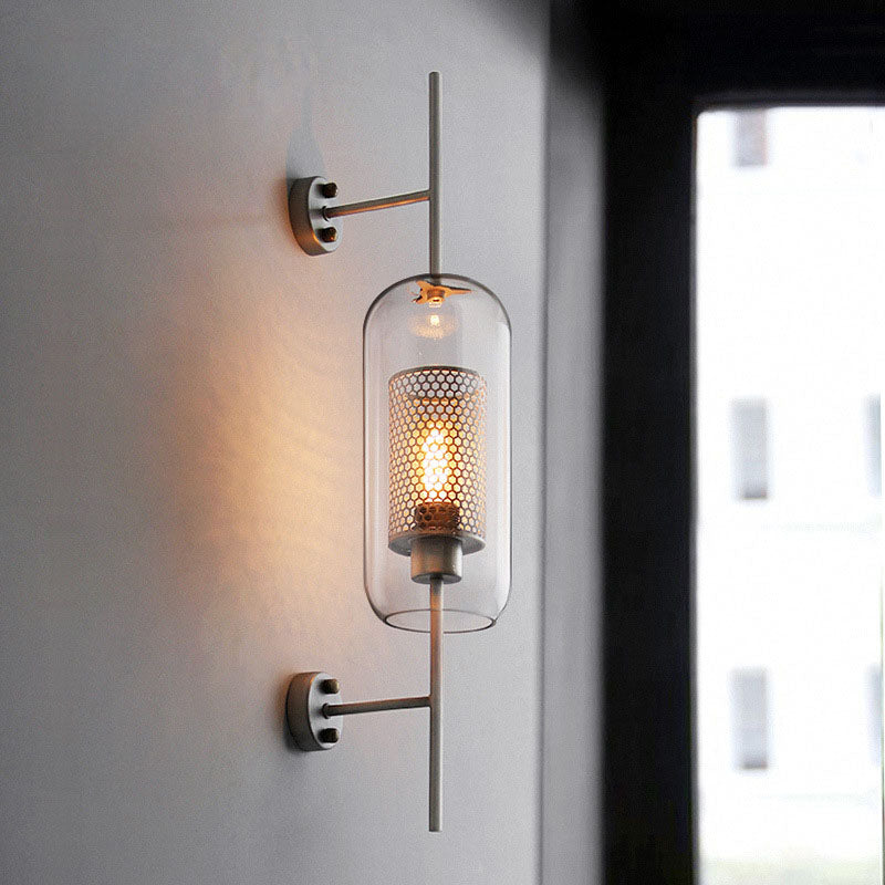 Applique da parete con paralume in vetro cilindrico industriale contemporaneo e struttura in ferro, lampada a 1 luce per camera da letto