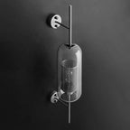 Applique da parete con paralume in vetro cilindrico industriale contemporaneo e struttura in ferro, lampada a 1 luce per camera da letto