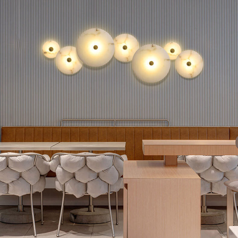 Lampada da parete LED in marmo rotondo di lusso contemporaneo in ferro per soggiorno e camera da letto