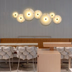 Lampada da parete LED in marmo rotondo di lusso contemporaneo in ferro per soggiorno e camera da letto