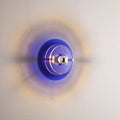 Applique da parete a forma di disco volante in ferro e acrilico colorato contemporaneo per sala di intrattenimento con 1 luce