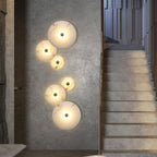 Lampada da parete LED in marmo rotondo di lusso contemporaneo in ferro per soggiorno e camera da letto