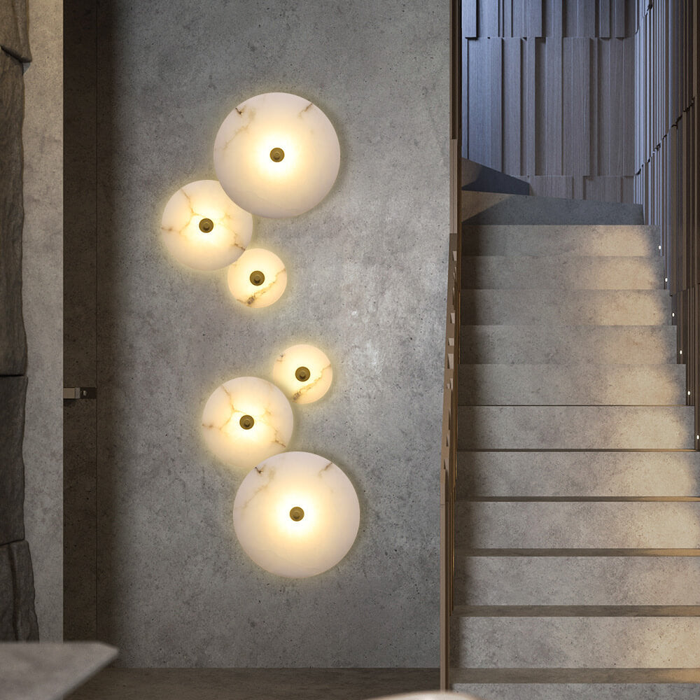 Lampada da parete LED in marmo rotondo di lusso contemporaneo in ferro per soggiorno e camera da letto