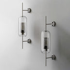 Applique da parete con paralume in vetro cilindrico industriale contemporaneo e struttura in ferro, lampada a 1 luce per camera da letto