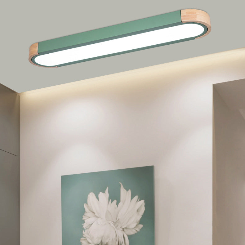 Lampada da soffitto a LED Flush Mount in ferro ovale lungo scandinavo contemporaneo per camera da letto