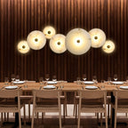Lampada da parete LED in marmo rotondo di lusso contemporaneo in ferro per soggiorno e camera da letto