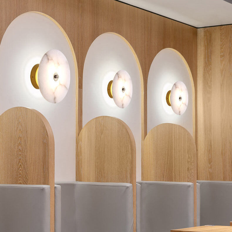 Lampada da parete LED in marmo rotondo di lusso contemporaneo in ferro per soggiorno e camera da letto