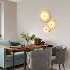 Lampada da parete LED in marmo rotondo di lusso contemporaneo in ferro per soggiorno e camera da letto