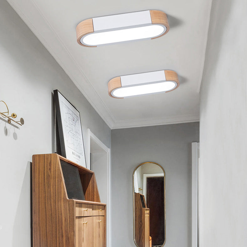 Lampada da soffitto a LED Flush Mount in ferro ovale lungo scandinavo contemporaneo per camera da letto