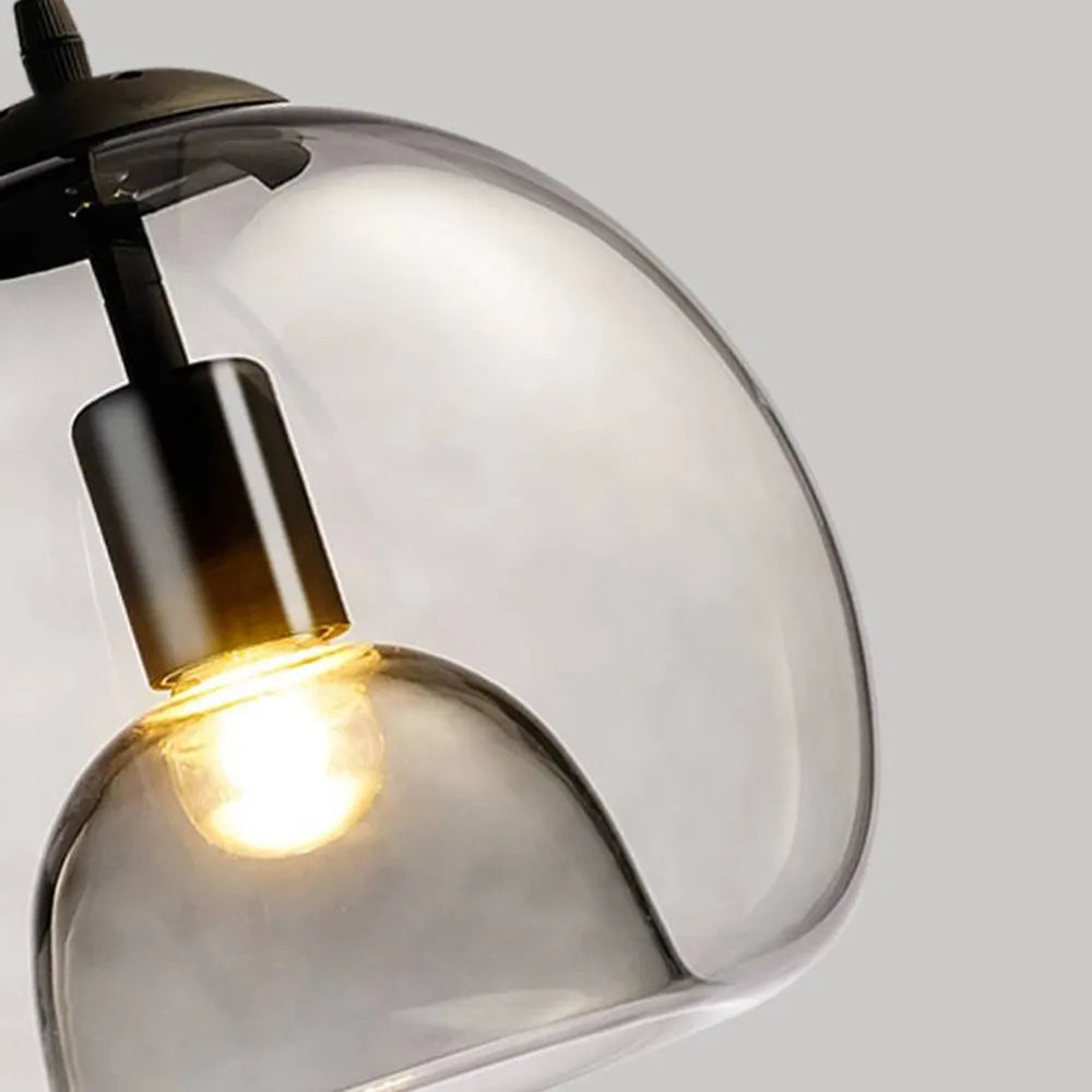 Lampada a sospensione in vetro Globe di Giugno, Ambra/Grigio Fumè