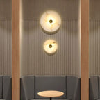 Lampada da parete LED in marmo rotondo di lusso contemporaneo in ferro per soggiorno e camera da letto
