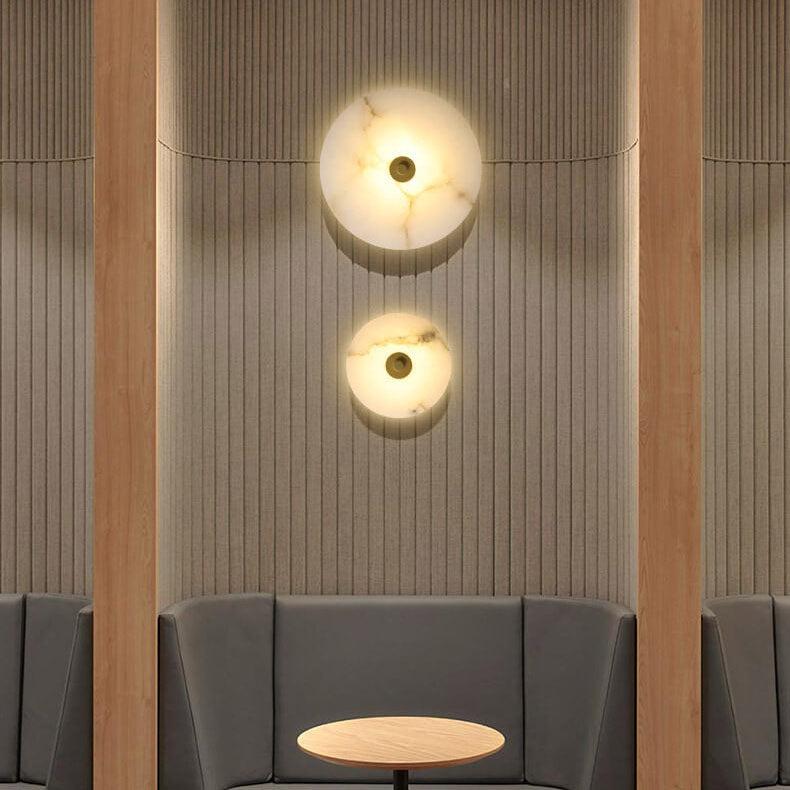 Lampada da parete LED in marmo rotondo di lusso contemporaneo in ferro per soggiorno e camera da letto