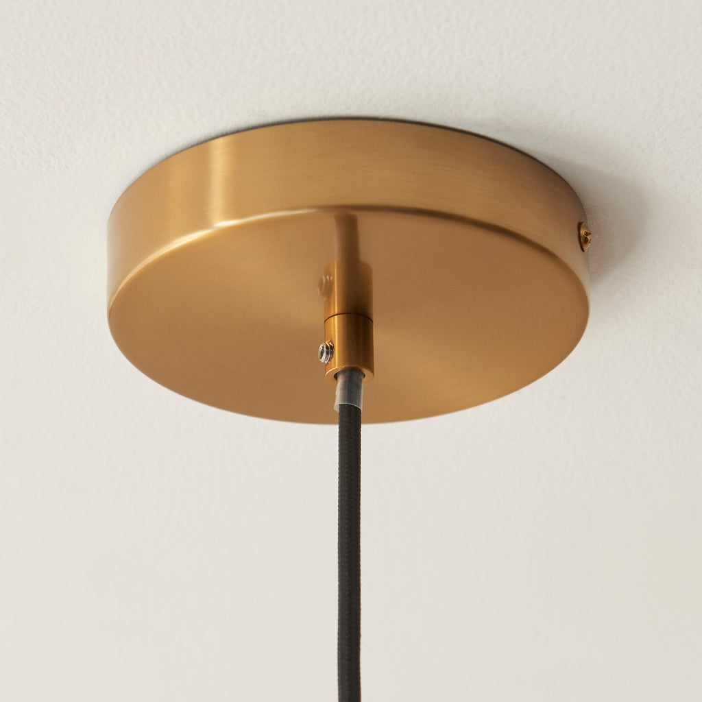 Lampada a sospensione in pietra travertino e ottone - Paralume in vetro