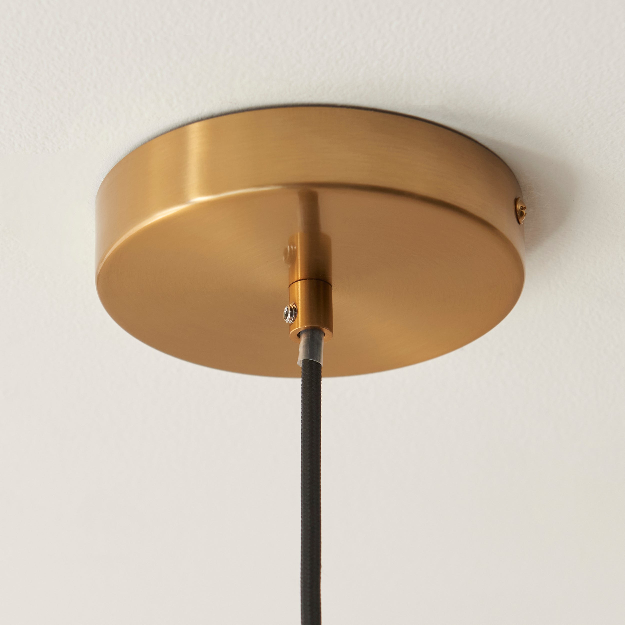 Lampada a sospensione in pietra travertino e ottone - Paralume in vetro