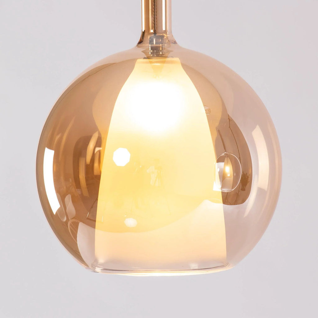 Lampada a sospensione in vetro sferico minimalista