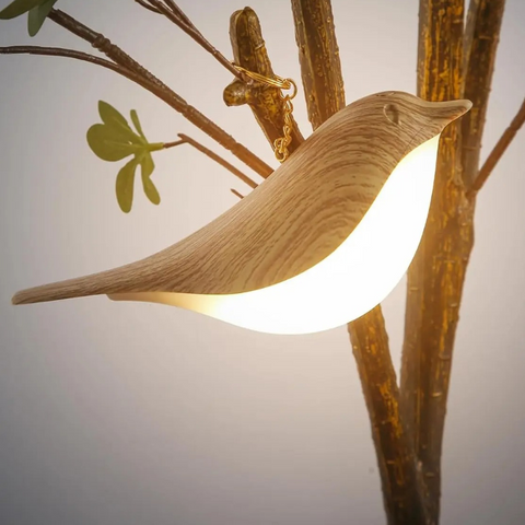 Lampada da tavolo a forma di uccello con corpo retroilluminato
