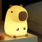 CapyGlow - Dolce lampada da notte LED con morbida luce calda e affascinante design di Capybara
