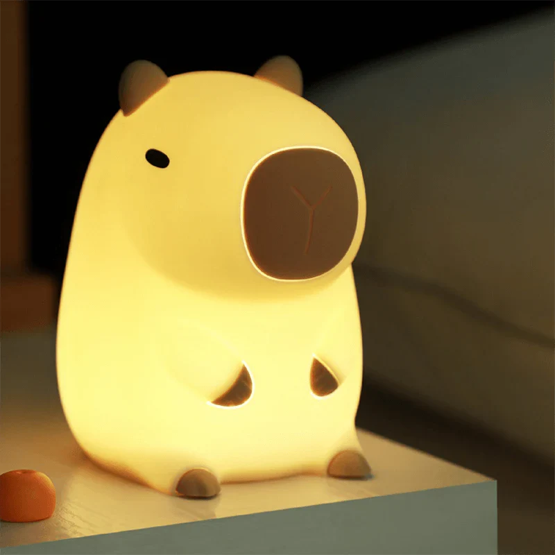 CapyGlow - Dolce lampada da notte LED con morbida luce calda e affascinante design di Capybara