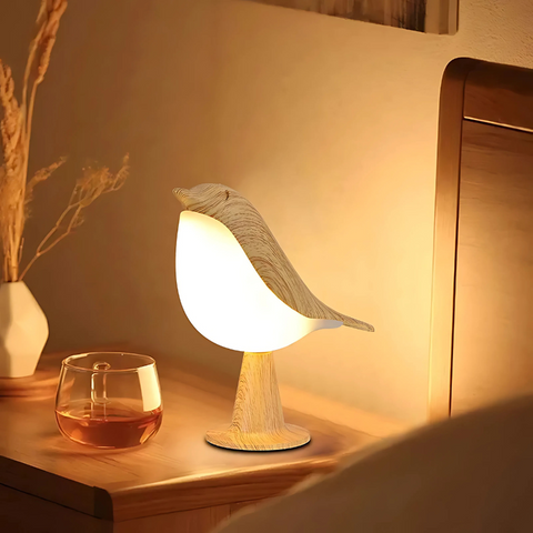 Lampada da tavolo a forma di uccello con corpo retroilluminato