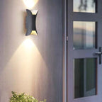 Lampada a LED da esterno Noxel montata a parete curva