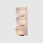 Lampada da parete a gradini in alabastro