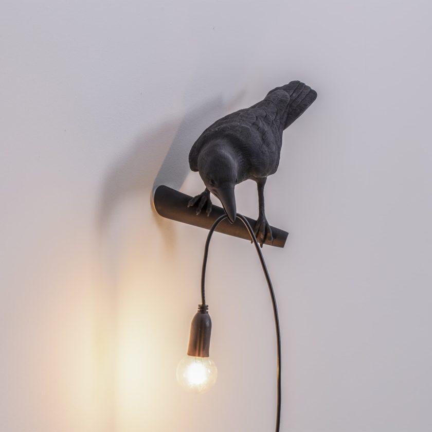 Lampada da muro a forma di uccello
