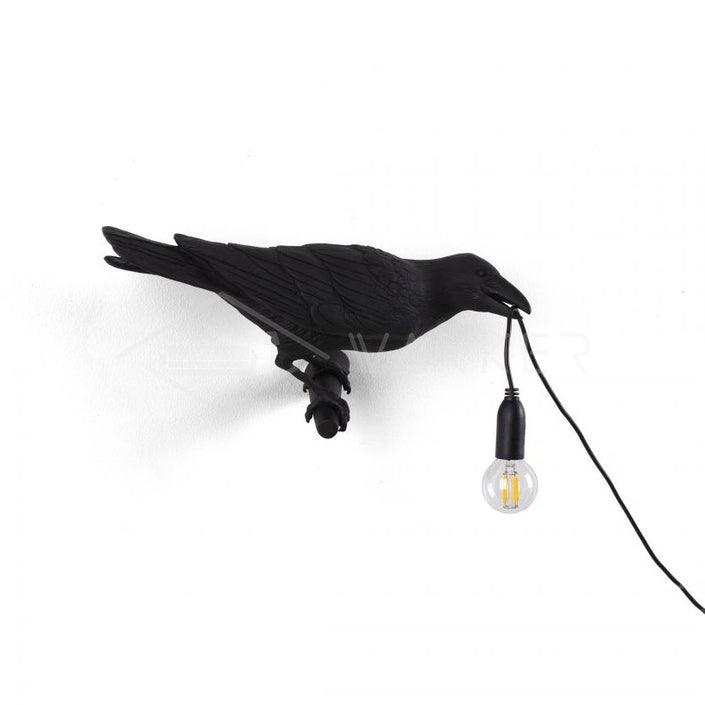 Lampada da muro a forma di uccello