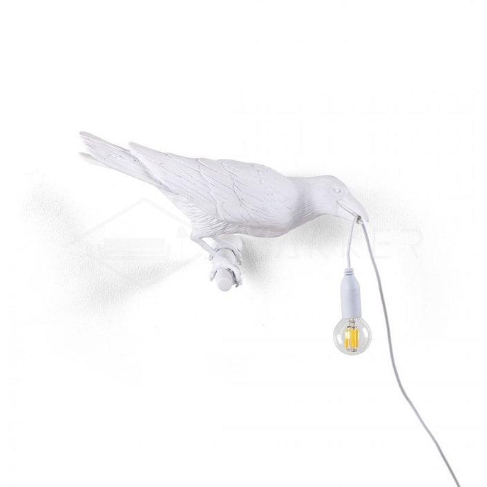 Lampada da muro a forma di uccello