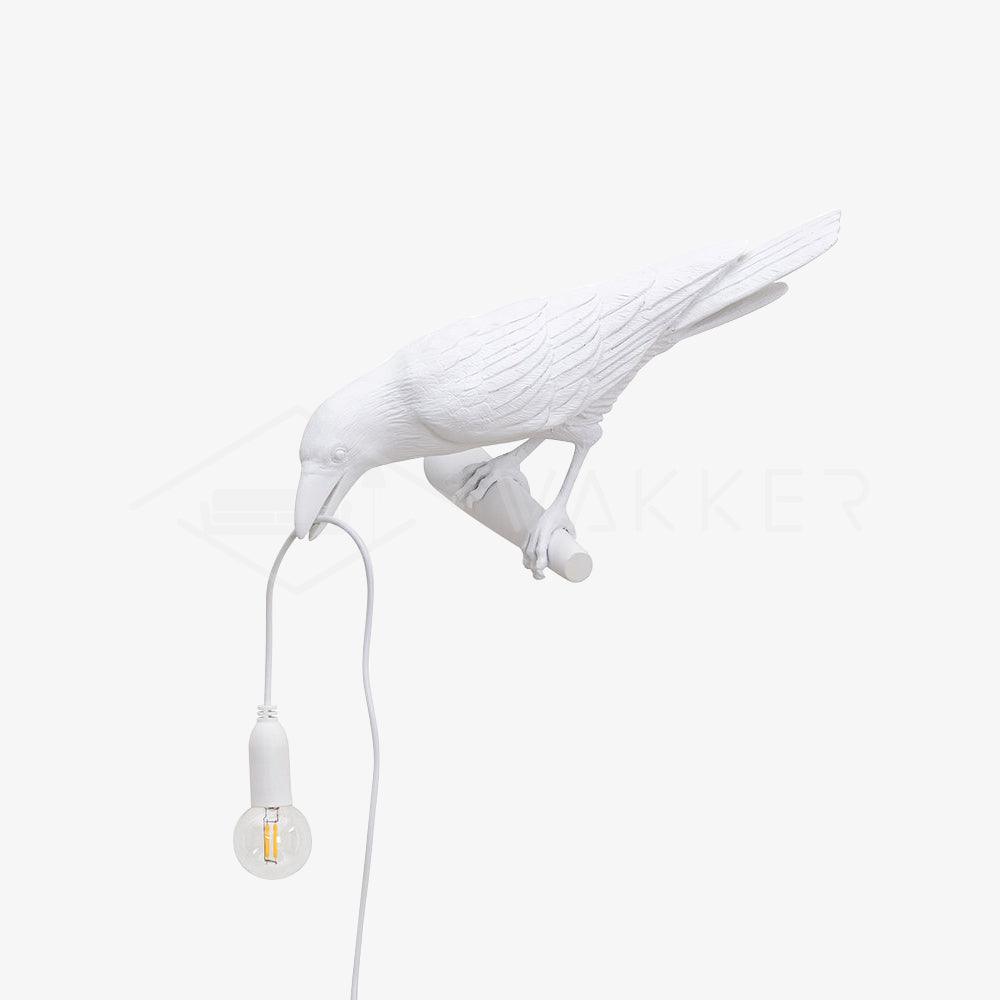 Lampada da muro a forma di uccello
