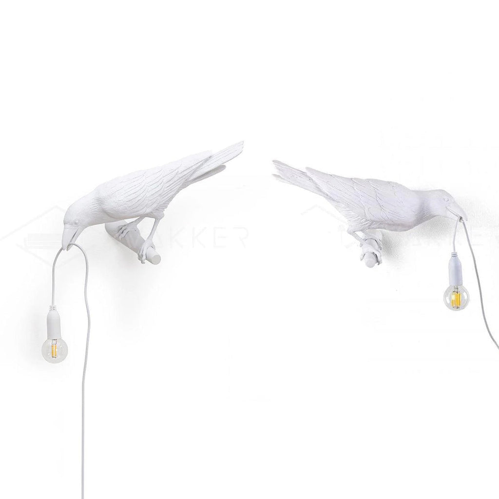 Lampada da muro a forma di uccello