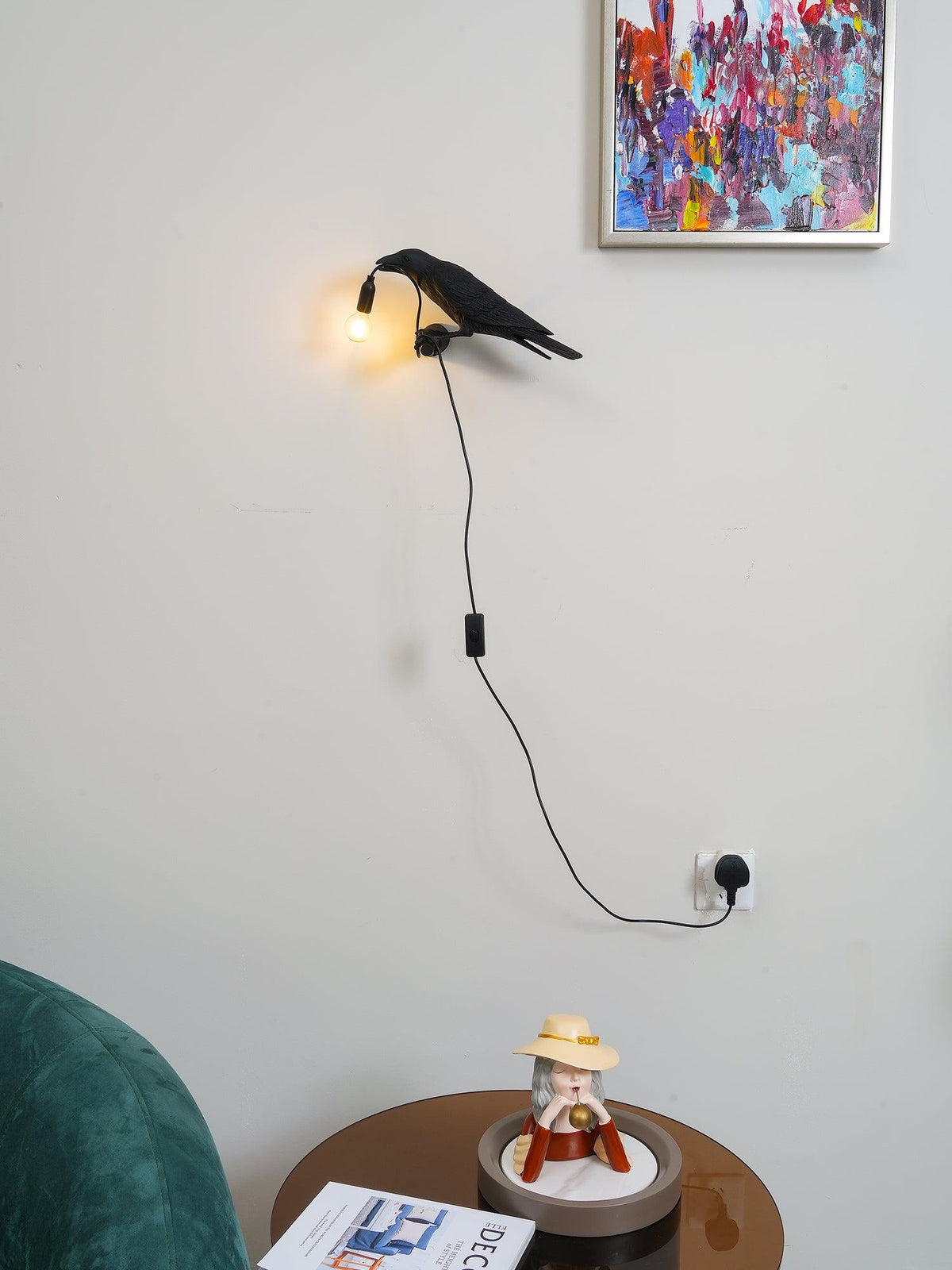 Lampada da muro a forma di uccello