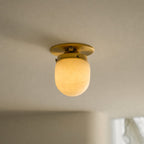 Lampada da soffitto in alabastro a forma di proiettile