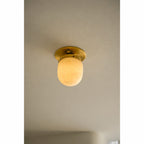 Lampada da soffitto in alabastro a forma di proiettile