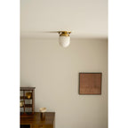 Lampada da soffitto in alabastro a forma di proiettile