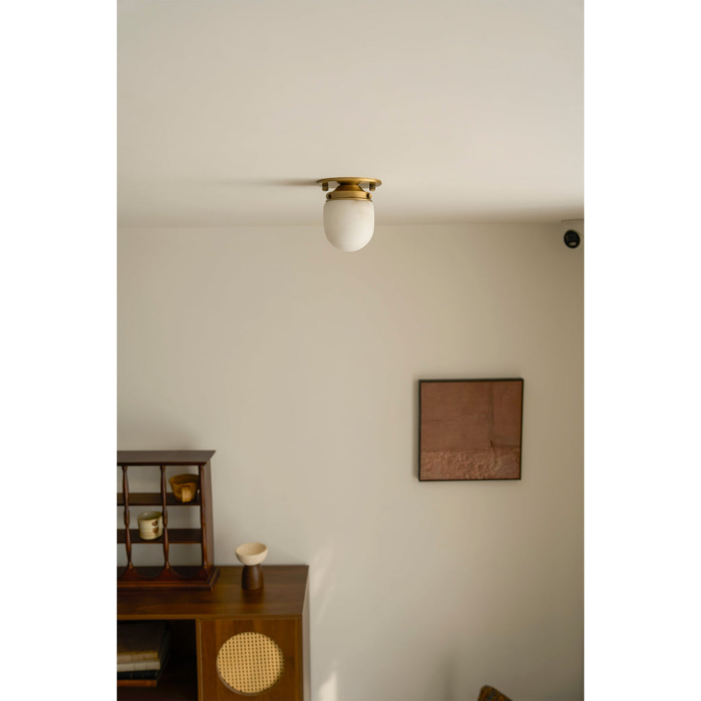 Lampada da soffitto in alabastro a forma di proiettile
