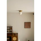 Lampada da soffitto in alabastro a forma di proiettile