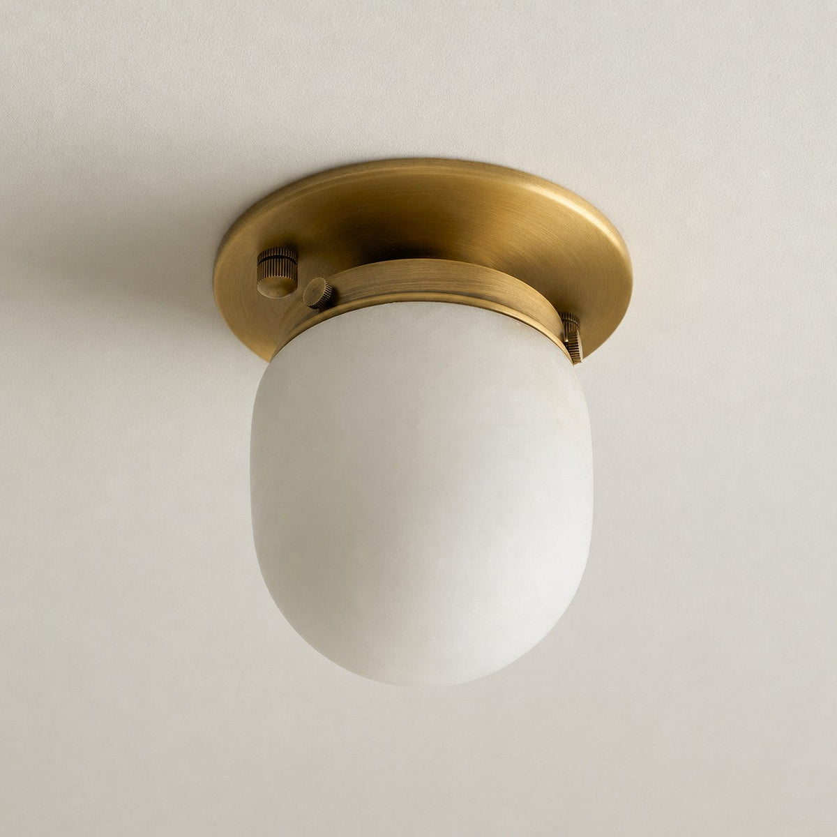 Lampada da soffitto in alabastro a forma di proiettile