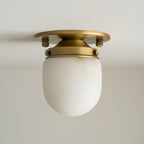 Lampada da soffitto in alabastro a forma di proiettile