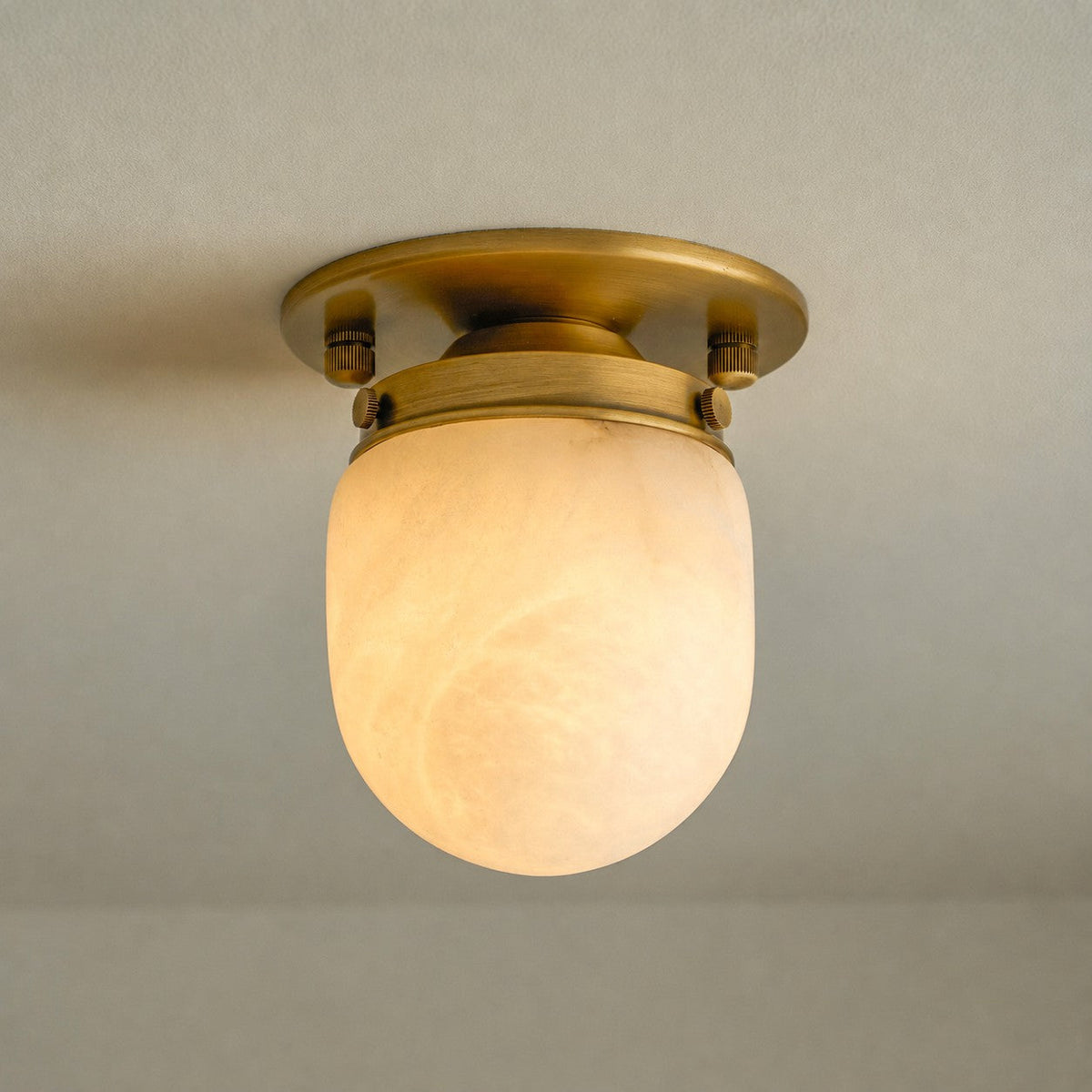 Lampada da soffitto in alabastro a forma di proiettile