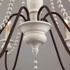 Lampadario a perline in stile candela