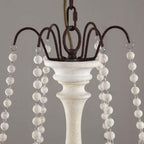 Lampadario a perline in stile candela
