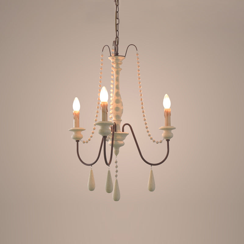 Lampadario a perline in stile candela