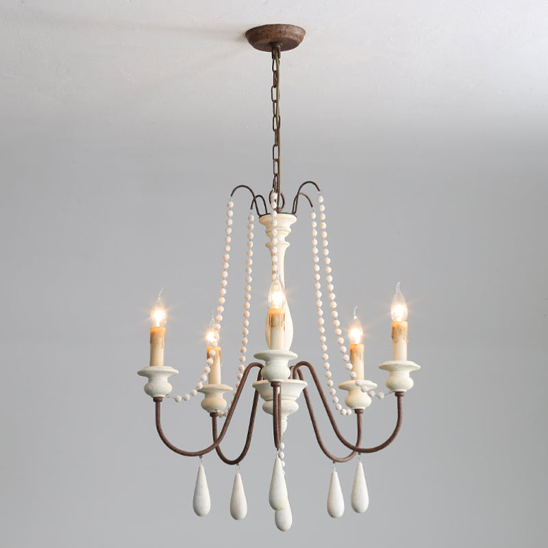 Lampadario a perline in stile candela