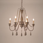 Lampadario a perline in stile candela