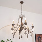 Lampadario a perline in stile candela