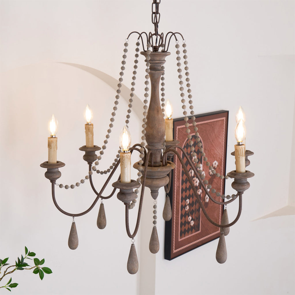 Lampadario a perline in stile candela
