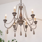 Lampadario a perline in stile candela