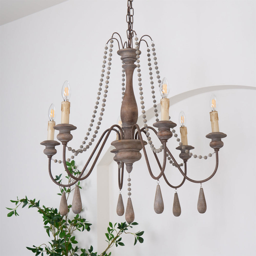 Lampadario a perline in stile candela